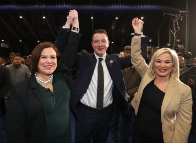 John Finucane celebrates with Mary Lou McDonald and Michelle O'Neill.