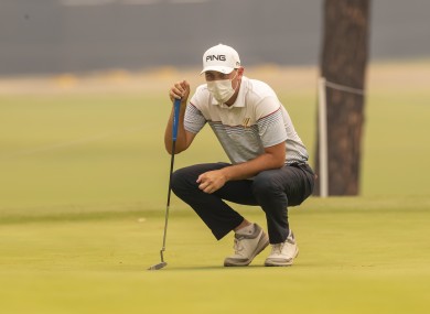 Ryan Chisnall wears a face mask during the first round of the Australian Open.