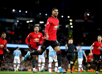 Manchester United's Marcus Rashford celebrates scoring.