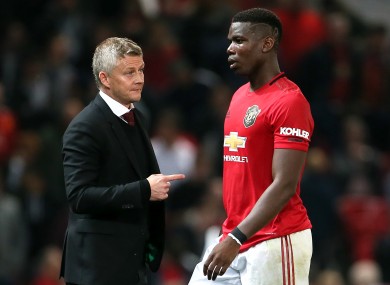 Ole Gunnar Solskjaer and Paul Pogba pictured during Manchester United's Carabao Cup game against Rochdale in September.