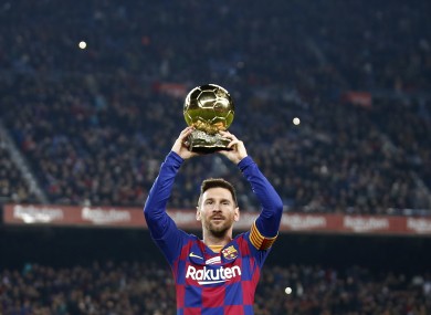 Messi is given his latest Ballon D'Or award ahead of kick-off.