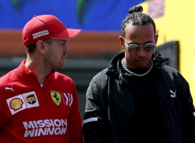 World champion Lewis Hamilton (right) and Ferrari's Sebastian Vettel.