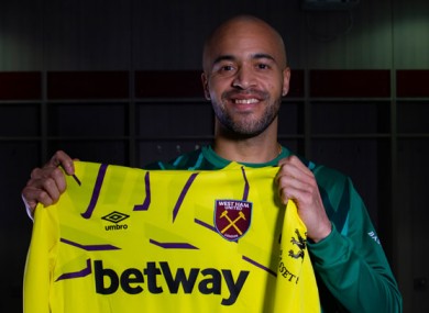 The Wicklow stopper holding up his Hammers shirt.