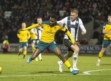 St Mirren defender Sean McLoughlin tangling with Odsonne Edouard of Celtic.