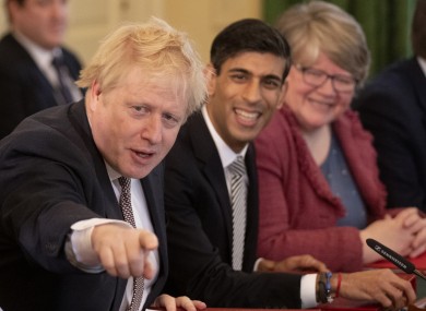 Johnson with members of his new Cabinet at their first meeting today since the reshuffle.