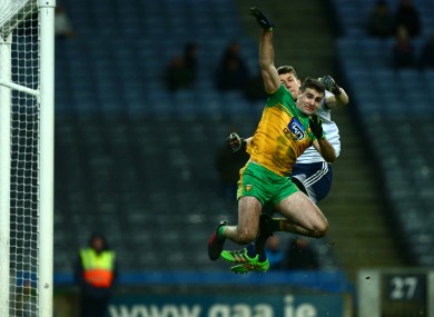 Donegal's Caolan McGonigle collides with Dublin's Evan Comerford.