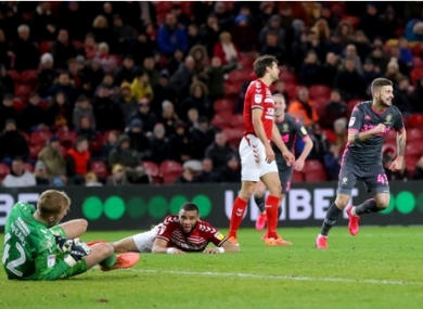 Leeds United's Mateusz Klich (right) celebrates scoring his side's winning goal.