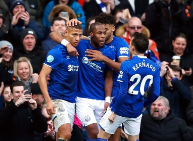 On the up: Richarlison and his Everton team-mates celebrate.