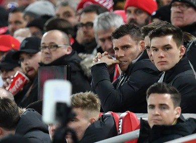 James Milner pictured watch Liverpool's FA Cup win last night.