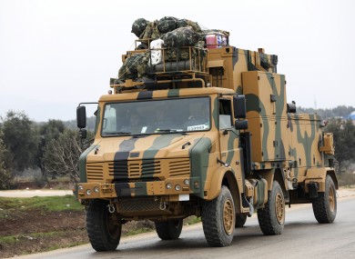 A Turkish military convoy drive in the east of Idlib in Syria