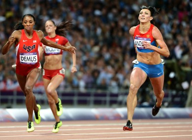 Natalya Antyukh crosses the line ahead of Lashinda Demus to win the 2012 Olympic 400m hurdle final.