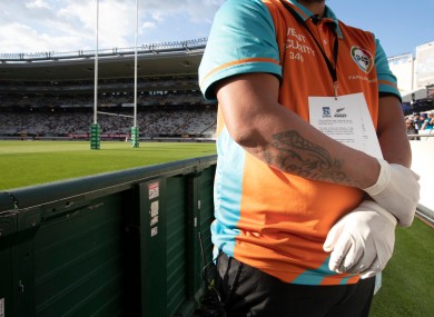 Security at this morning's match between the Blues and Lions in Auckland wearing protective gloves.
