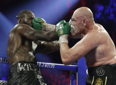 Tyson Fury, of England, lands a right to Deontay Wilder (file pic).