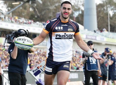 Tom Wright celebrates scoring a try for the Brumbies.