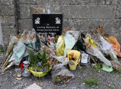 2017: Tributes left at the site of a mass grave for children who died in the Tuam mother and baby home.