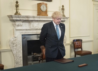 Britain's Prime Minister Boris Johnson pictured yesterday during a minute's silence to pay tribute to health service and key workers who have died during the coronavirus outbreak.