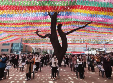 South Korean Buddhists pictured during a service to celebrate Buddha's birthday at the Chogyesa temple in Seoul, South Korea. 30 April