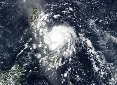A satellite image released by NASA shows Typhoon Vongfong roaring toward the eastern Philippines.