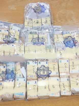 Cash discovered during the searches.