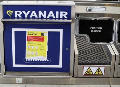 Coronavirus information at a Ryanair check in desk at Dublin airport.