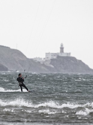 icardo Altieri from Dublin enjoying gusty winds off Bull Island, Dublin this afternoon.