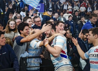 Teddy Baubigny of Racing 92 celebrates with fans in February: Paris club sit third in abandoned Top 14 table.