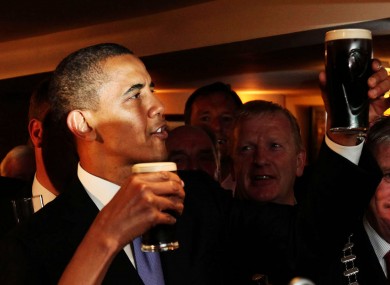 Obama enjoys a pint of the black stuff on his trip to Ireland.