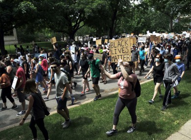 People march from the governor's mansion in St. Paul, Minneapolis on Saturday