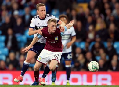 Jake Doyle-Hayes under pressure from Adam Forshaw during a Carabao Cup game between Aston Villa and Middlesbrough in September 2017.