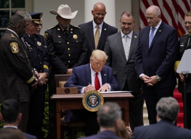 President Donald Trump signs an executive order on police reform
