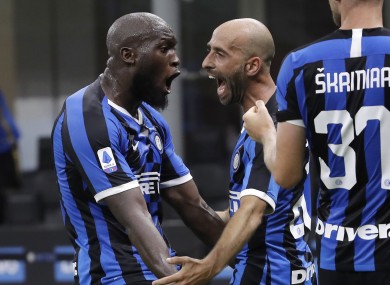 Inter Milan's Borja Valero, centre, celebrates with his teammates Romelu Lukaku, left, and Milan Skriniar after scoring his side's third goal.