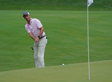 Brendon Todd putts on the 15th green during the third round of the Travelers Championship golf tournament.