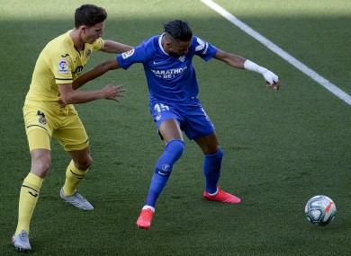 Pau Torres and En-Nesyri in action during the clash between Villareal and Sevilla.