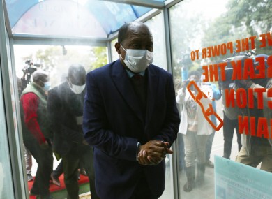 Zimbabwe's health minister, Obadiah Moyo, arriving at court in Harare today