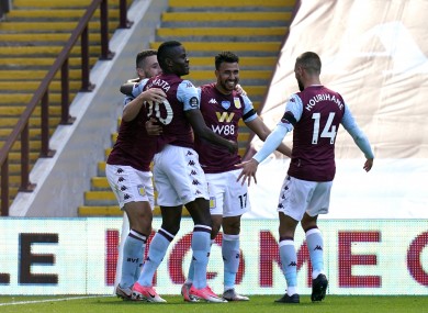 Aston Villa's Trezeguet (third left) celebrates scoring.