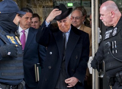 Republican strategist Roger Stone leaves federal court following his sentencing to 40 months in prison.