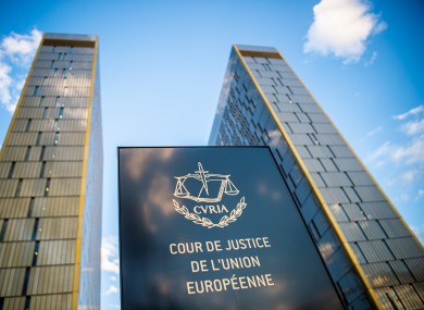 A sign in front of the office towers of the European Court of Justice.