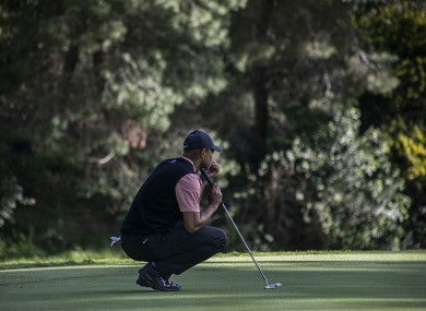 Tiger Woods reading the green during Round 1 of the PGA Tour Genesis Invitational back in February.