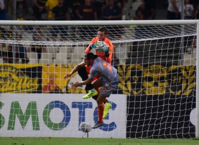 Celtic's new No1 Barkas, in action here for AEK, makes a brave save.