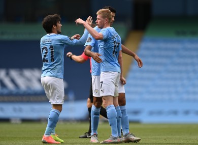 David Silva and Kevin De Bruyne celebrate during yesterday's game.