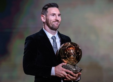 Lionel Messi with last year's Ballon D'Or award.