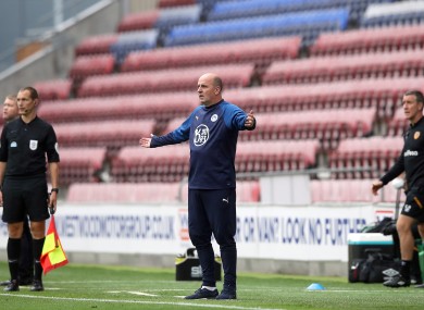 Cook on the touchline during Wigan's meeting with Hull earlier this month.