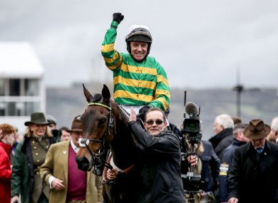 Barry Geraghty celebrates after winning the 2020 Champion Hurdle with Epatante.