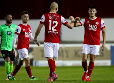 St. Pats' Georgie Kelly and Dan Ward celebrate after the game.