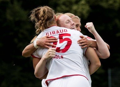 Barrett, centre, celebrates her winning goal against SC Sand - but it wasn't enough to save Köln from relegation.