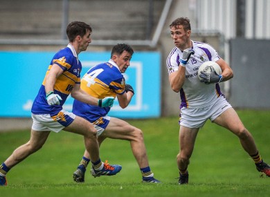 Paul Mannion in action for Kilmacud against the Castleknock defence.