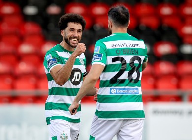 Seven up: Roberto Lopes, left, leads the Rovers celebrations at full time.