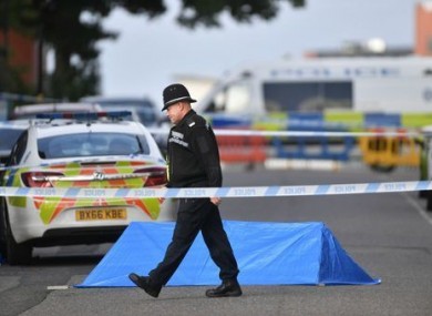 A police officer at a cordon in Irving Street in Birmingham after a number of people were stabbed in the city centre.