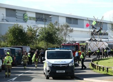 Police and fire services outside the Newsprinters printing works at Broxbourne.