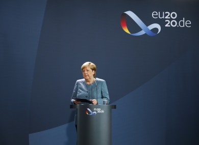 German Chancellor Angela Merkel leaves after a statement about latest developments in the case of Russian opposition leader Alexei Navalny.